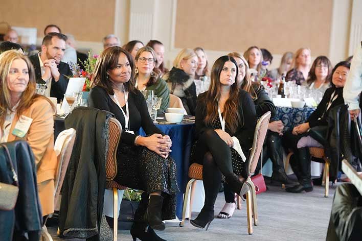 audience listening to presentation